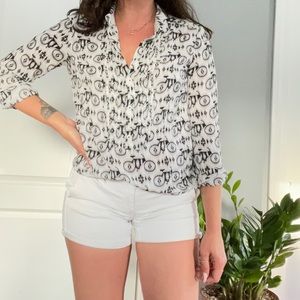 Vintage button down long sleeve blouse featuring old school bicycles